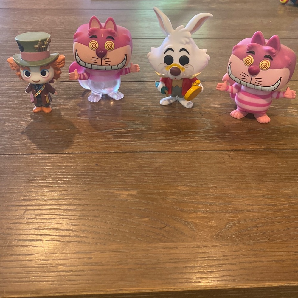 Disney Alice in wonderland figurines. Set of 4.